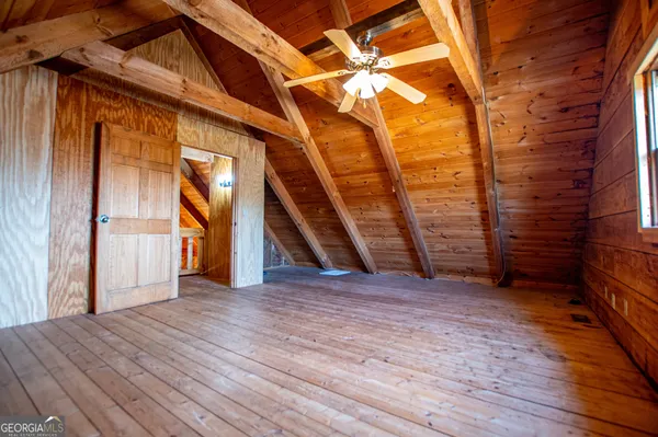 a view of swimming pool with seating area