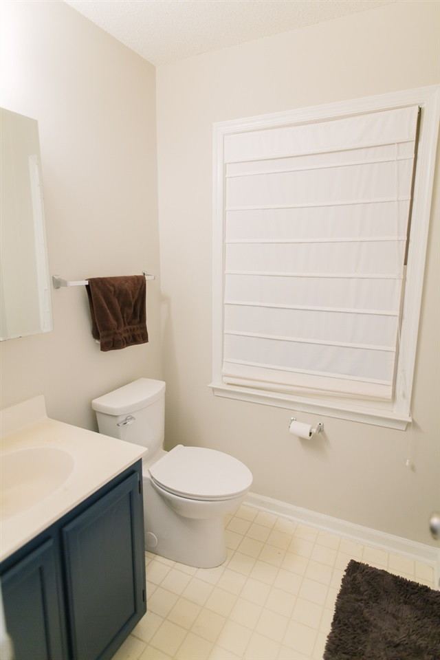 11808 North Exeter Way Raleigh, NC 27613 - Photo 26 of 30 Shower, Vanity, Window, Vinyl Floor, Light, Mirror, Toilet. Master Bath