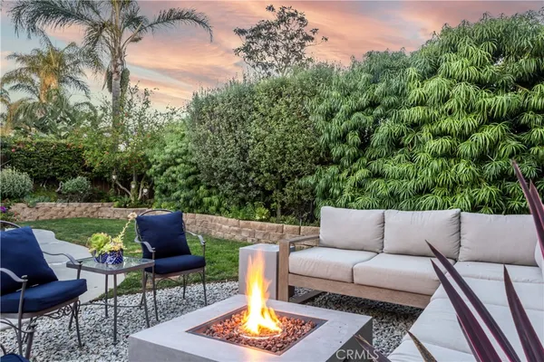 a outdoor living space with furniture and a garden