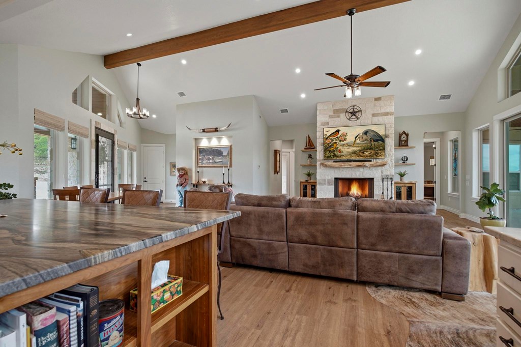 134 North Stallion Ests Drive Spring Branch, TX 78070 - Photo 12 of 67 a living room with furniture and a fireplace
