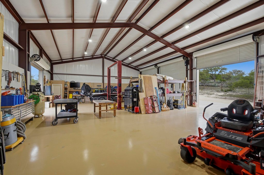 134 North Stallion Ests Drive Spring Branch, TX 78070 - Photo 44 of 67 a view of a garage with lots of stuff