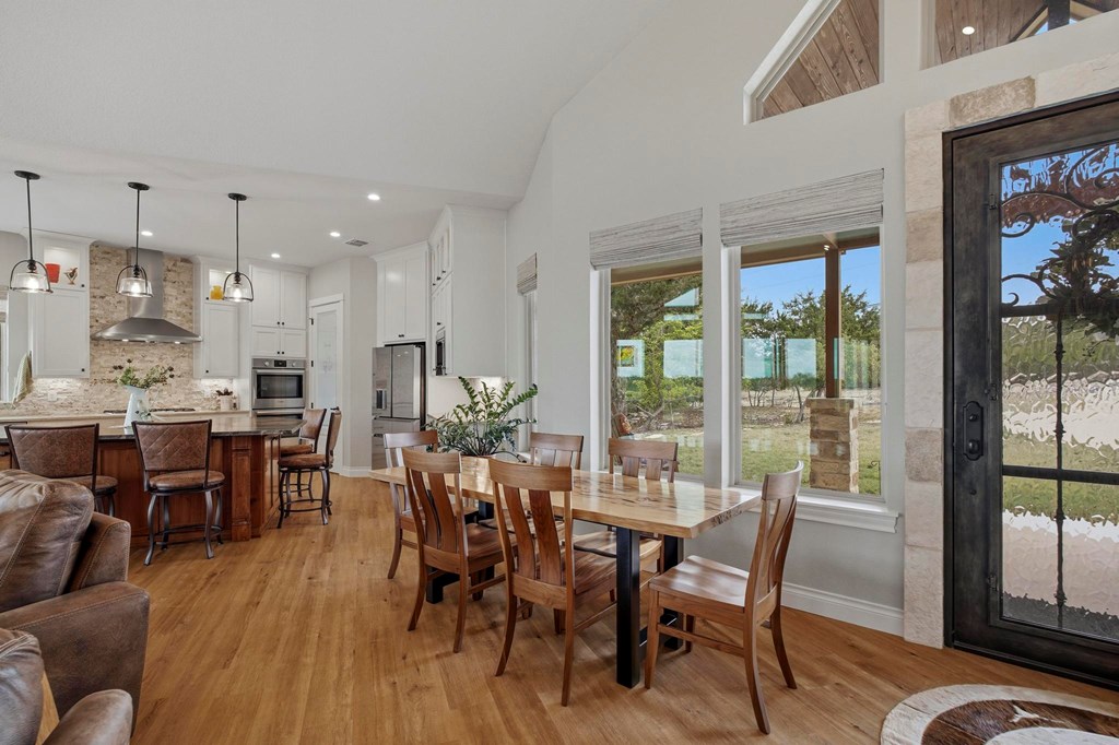 134 North Stallion Ests Drive Spring Branch, TX 78070 - Photo 5 of 67 a view of a dining room with furniture window and outside view