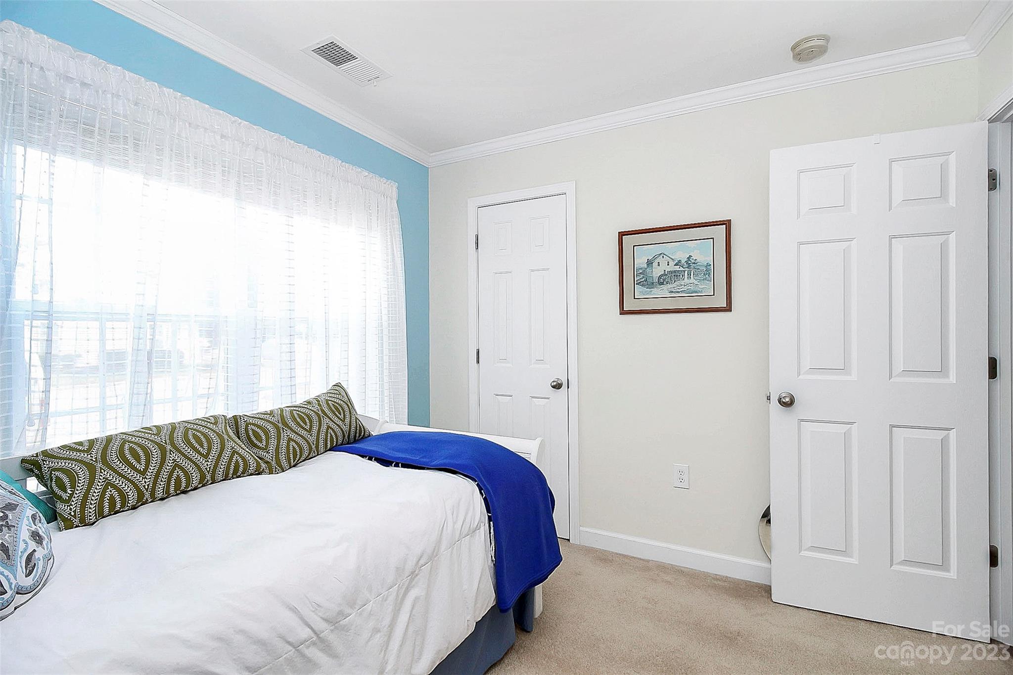 1919 Sandal Brook Road Indian Land, SC 29707 - Photo 16 of 35 a bedroom with a bed and a window