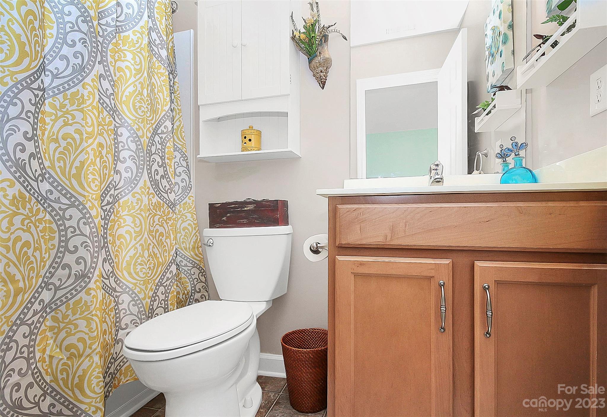 1919 Sandal Brook Road Indian Land, SC 29707 - Photo 23 of 35 a bathroom with a toilet sink and mirror