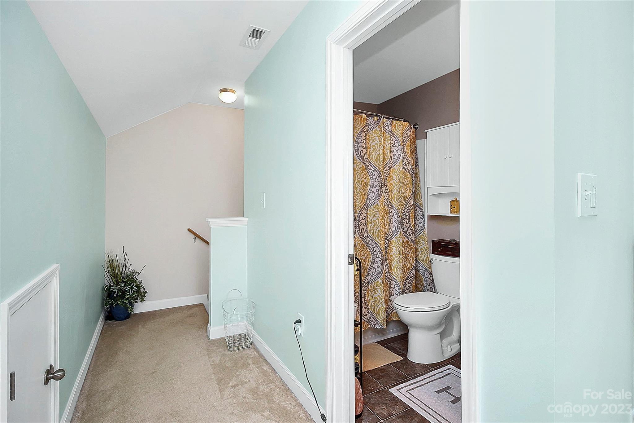 1919 Sandal Brook Road Indian Land, SC 29707 - Photo 27 of 35 a bathroom with a granite countertop sink a toilet and shower
