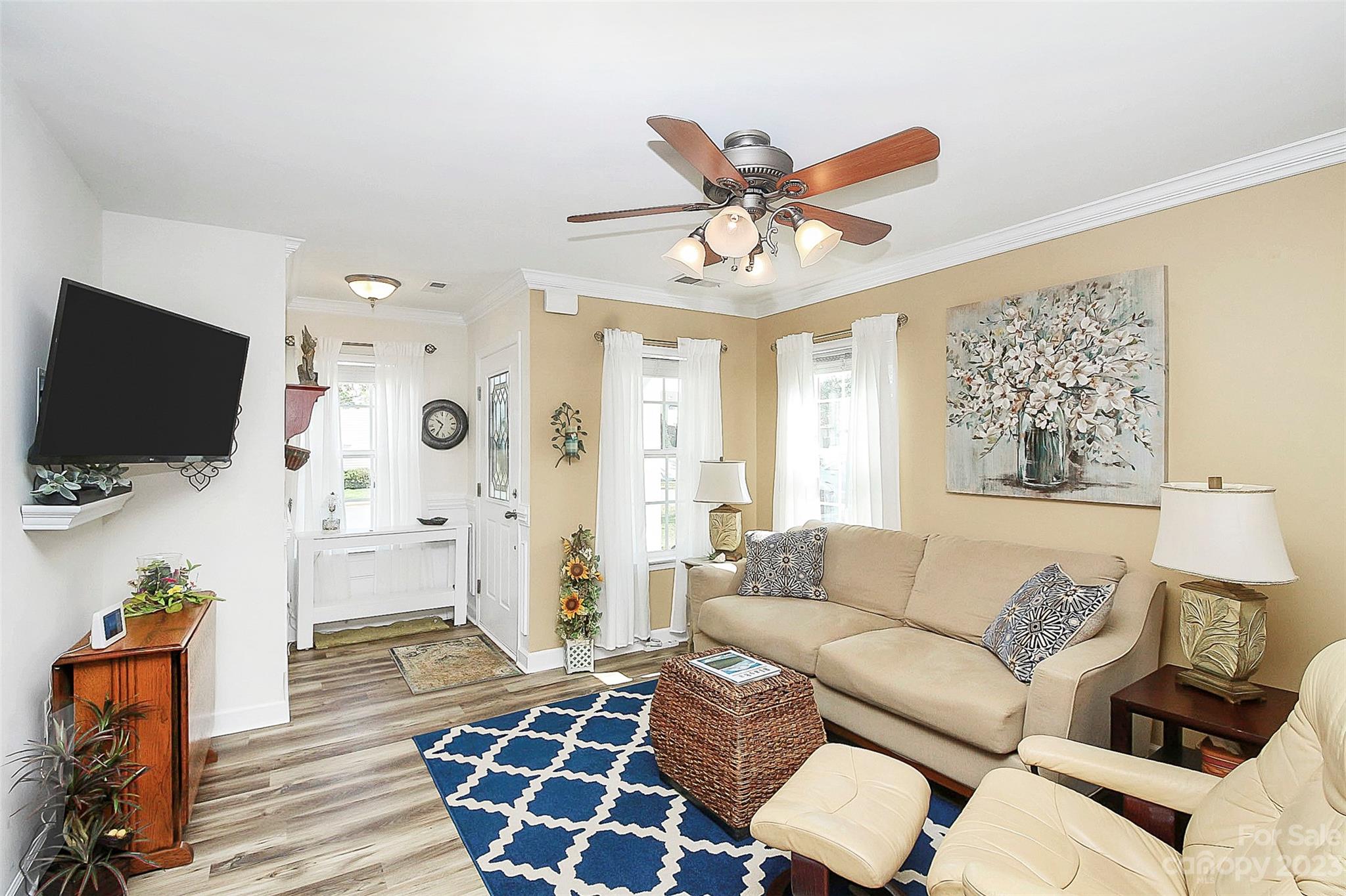 1919 Sandal Brook Road Indian Land, SC 29707 - Photo 8 of 35 a living room with furniture and a flat screen tv