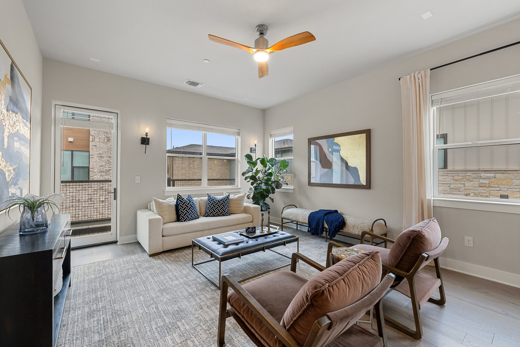 3900 Sightline Street, Unit 127 Austin, TX 78731 - Photo 12 of 39 a living room with furniture and a window