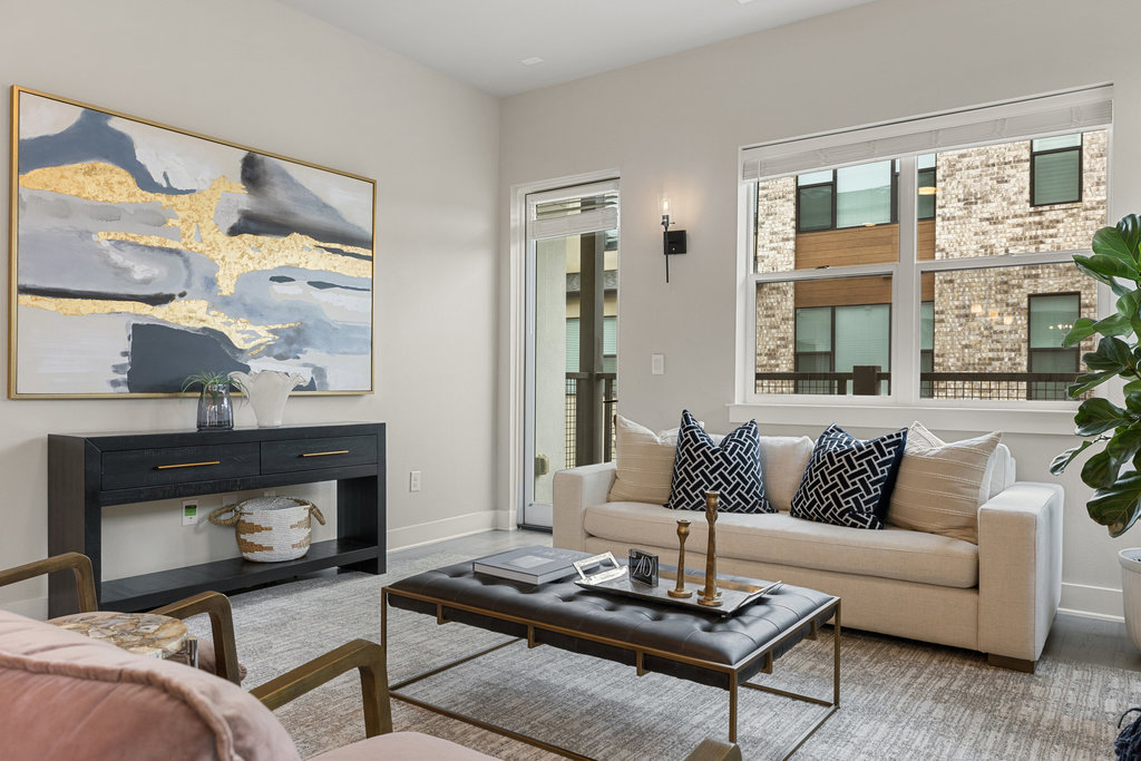 3900 Sightline Street, Unit 127 Austin, TX 78731 - Photo 13 of 39 a living room with furniture and a fireplace