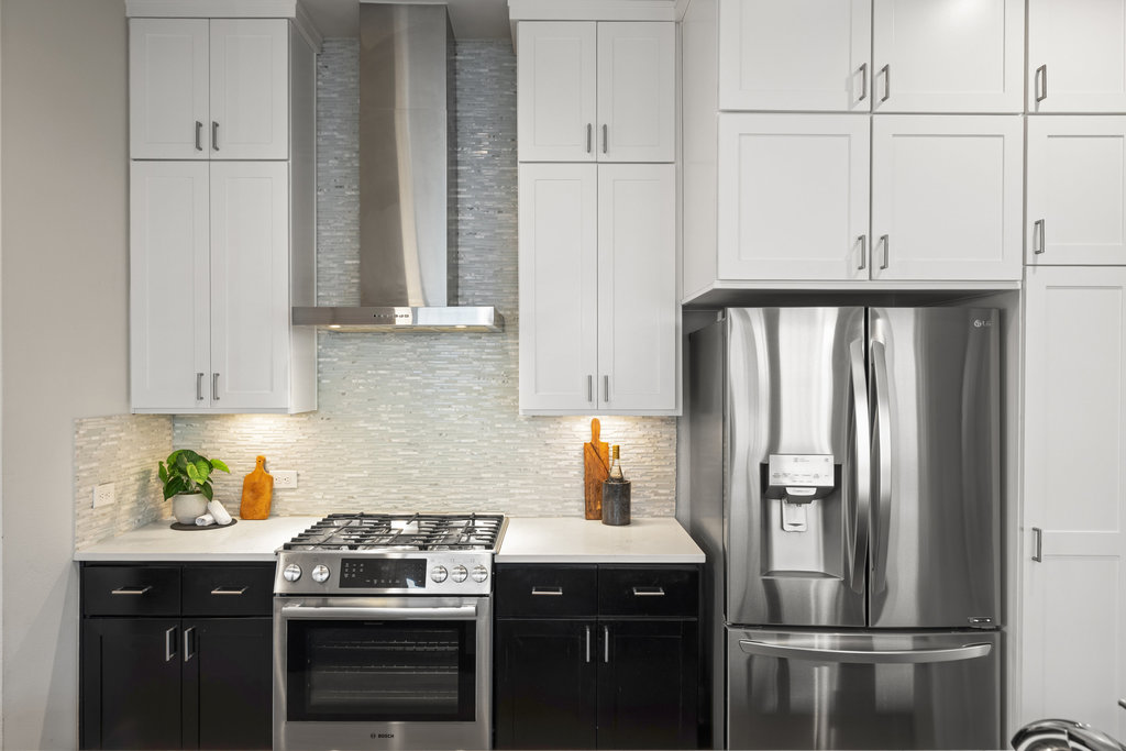 3900 Sightline Street, Unit 127 Austin, TX 78731 - Photo 22 of 39 a kitchen with appliances a sink and cabinets