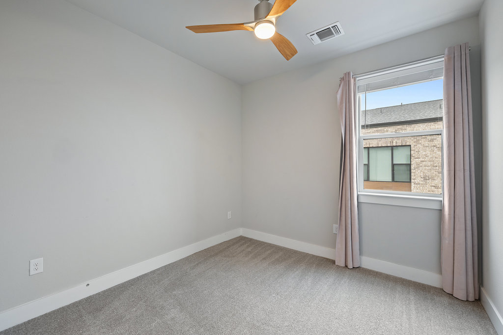 3900 Sightline Street, Unit 127 Austin, TX 78731 - Photo 28 of 39 an empty room with a window
