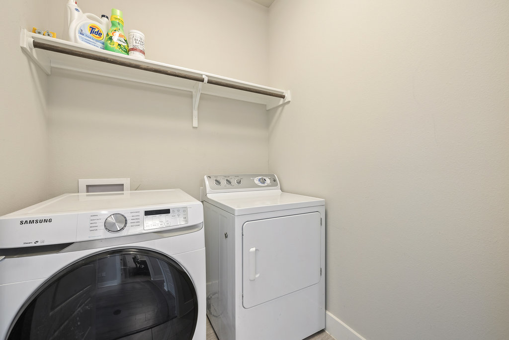 3900 Sightline Street, Unit 127 Austin, TX 78731 - Photo 36 of 39 a utility room with dryer and washer