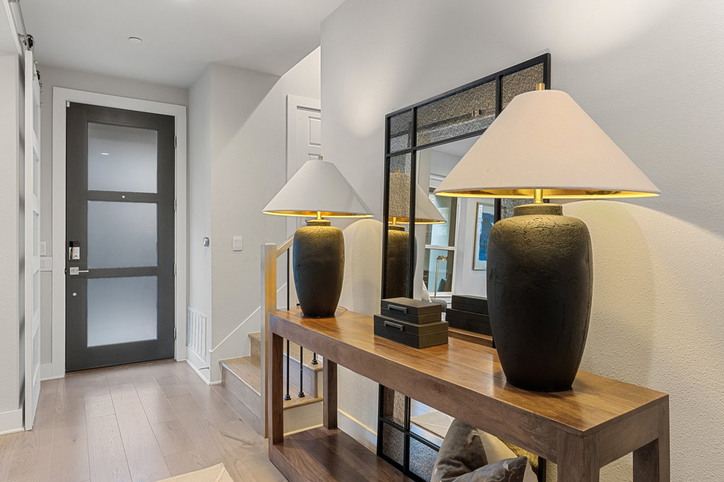 3900 Sightline Street, Unit 127 Austin, TX 78731 - Photo 5 of 39 a room with a table and a chair