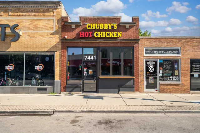 a view of a building with a entrance door of the building