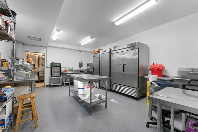 a view of a room with chairs