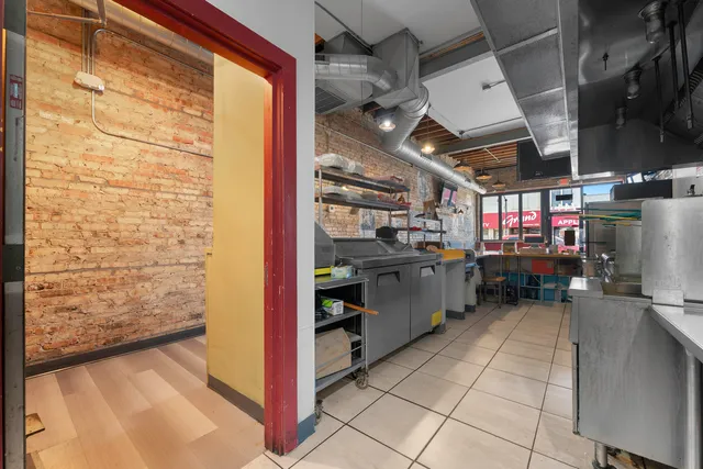 a kitchen with stainless steel appliances lots of counter space