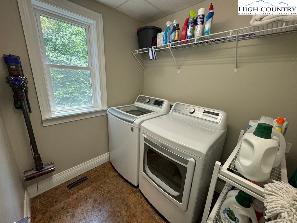 567 Locust Road Newland, NC 28657 - Photo 12 of 28 a utility room with dryer and washer