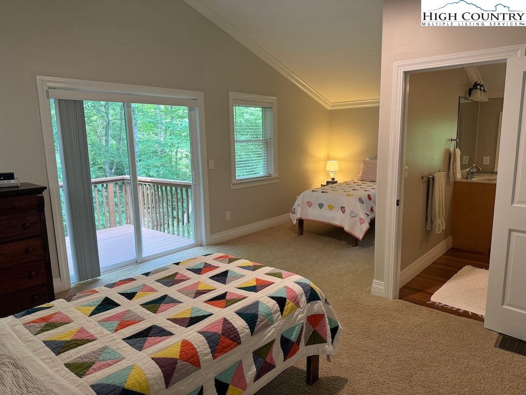 567 Locust Road Newland, NC 28657 - Photo 13 of 28 a bedroom with a bed and a window