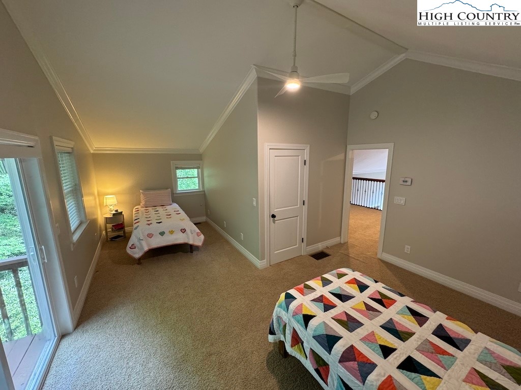 567 Locust Road Newland, NC 28657 - Photo 14 of 28 a bedroom with bed and a window
