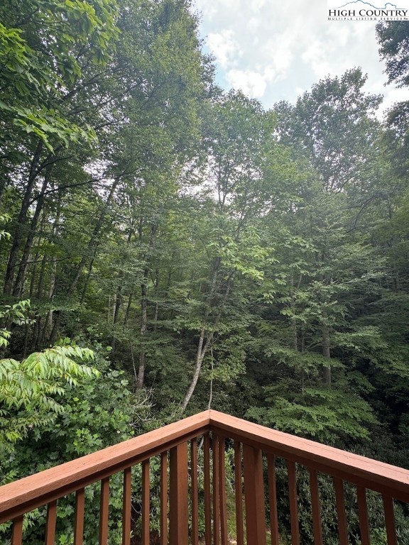 567 Locust Road Newland, NC 28657 - Photo 16 of 28 a balcony with trees