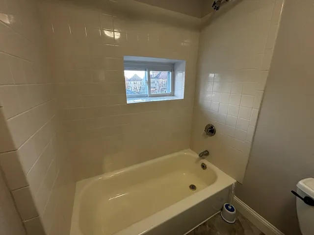 a bathroom with a bathtub