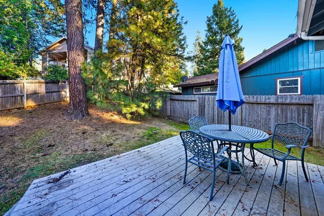 a view of a table and chairs in patio