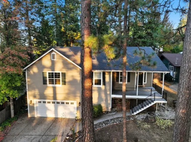 a view of a brick house with a large window