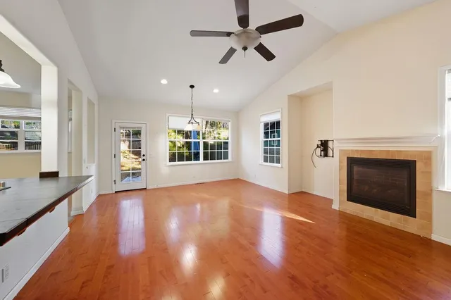 a view of a balcony with wooden floor