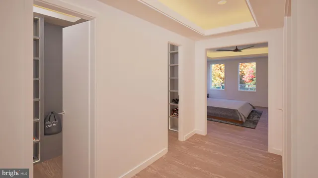 a bedroom with a bed and a mirror