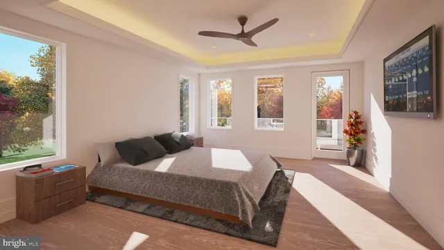 a bedroom with a large bed and a window