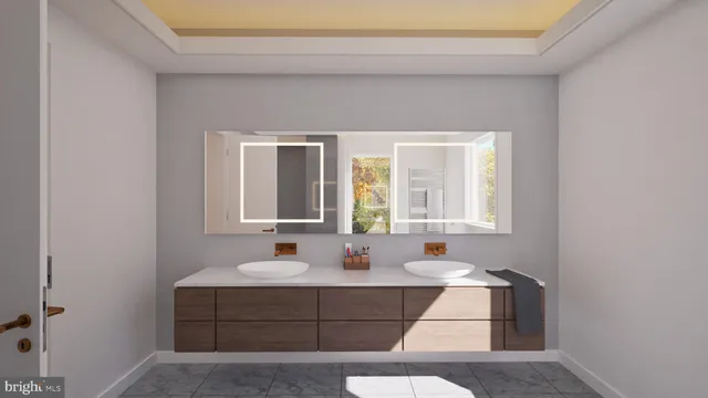 a bathroom with a sink vanity and a mirror