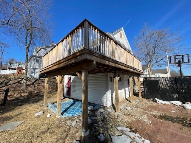 15 Wrentham Road Worcester, MA 01602 - Photo 3 of 16 a view of a house with a wooden fence