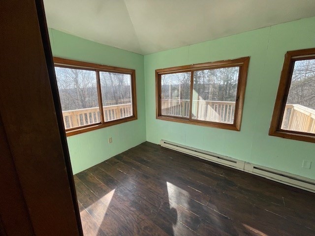 15 Wrentham Road Worcester, MA 01602 - Photo 8 of 16 an empty room with wooden floor and windows
