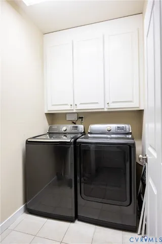 a stove top oven sitting inside of a kitchen