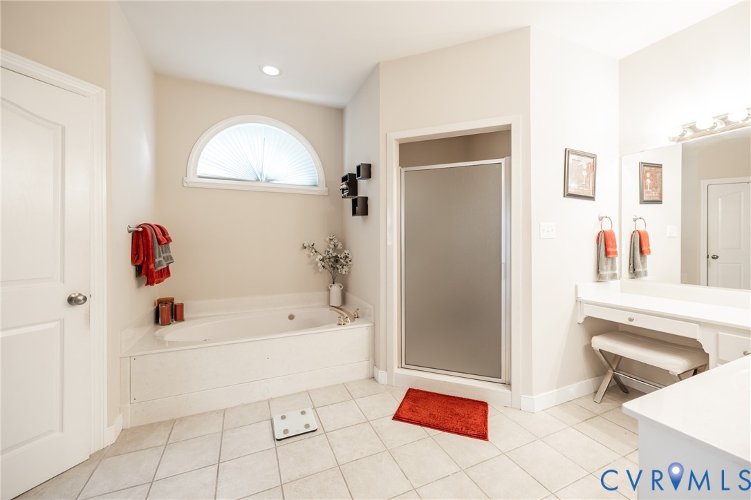 13902 Summersedge Terrace Chesterfield, VA 23832 - Photo 18 of 30 a bathroom with a bathtub and a sink