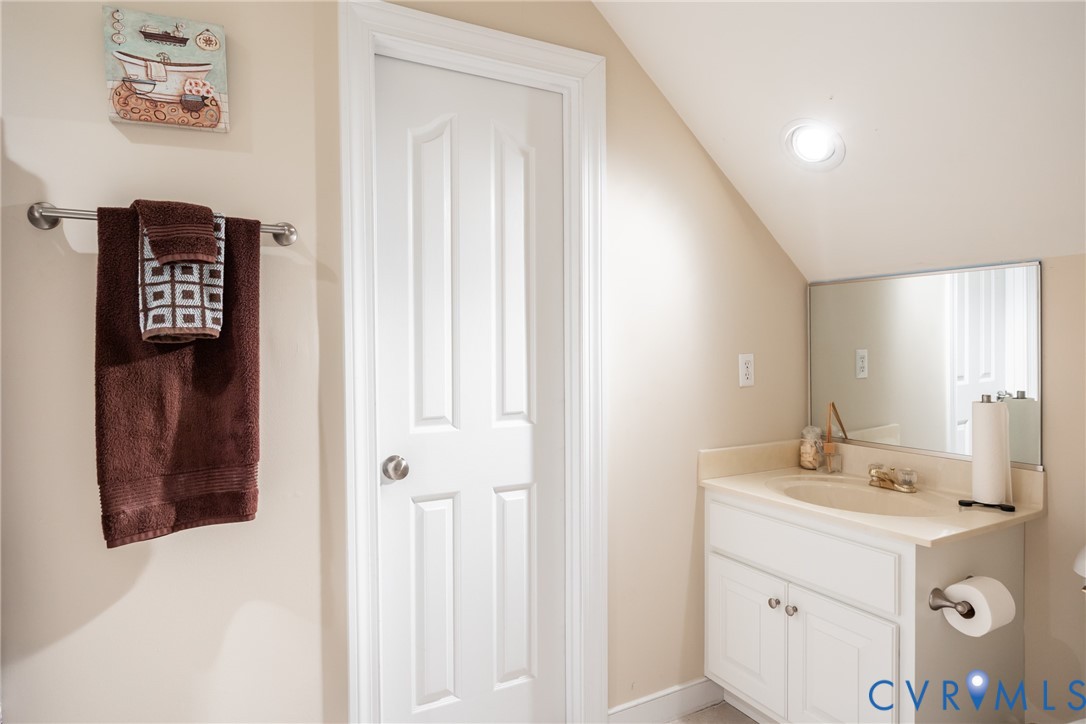 13902 Summersedge Terrace Chesterfield, VA 23832 - Photo 27 of 30 a bathroom with a sink a mirror and a shower