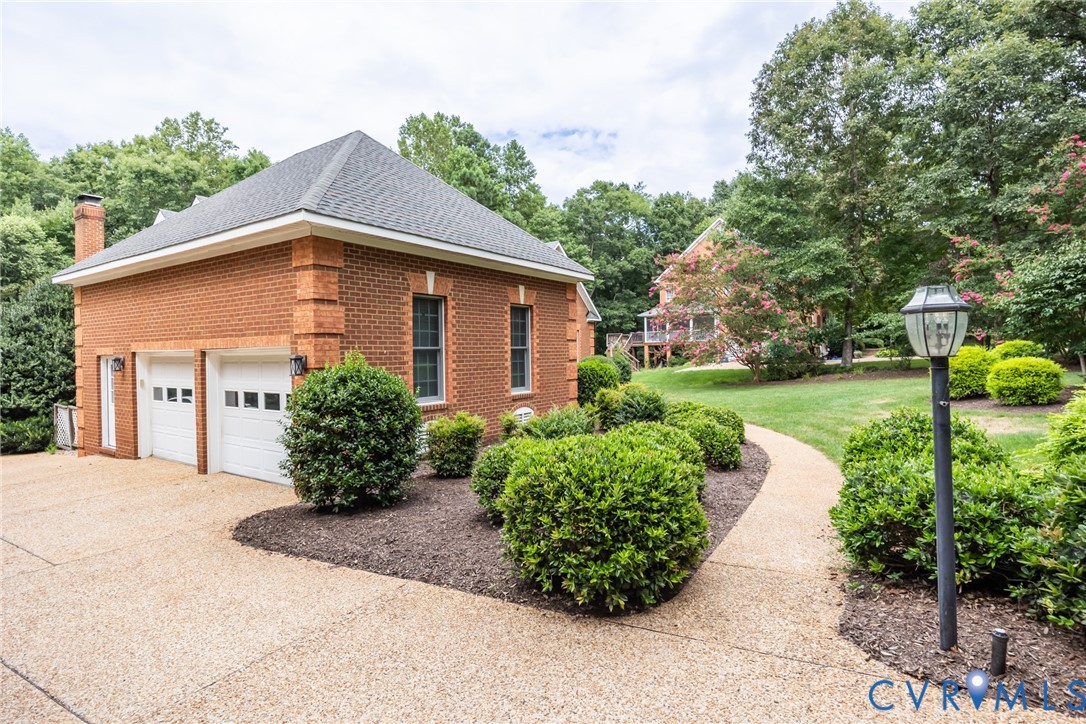 13902 Summersedge Terrace Chesterfield, VA 23832 - Photo 3 of 30 a front view of a house with a yard