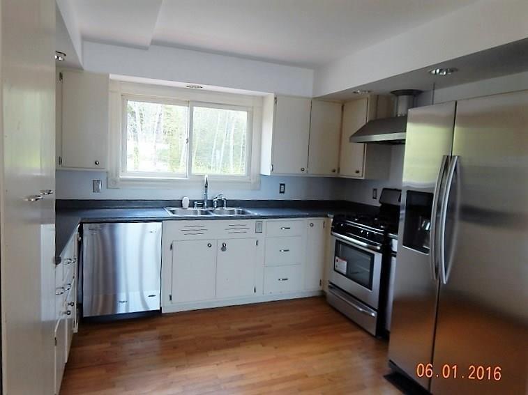 205 Deep Cove Road Winter Harbor, ME 04693 - Photo 9 of 25 The kitchen has new appliances set...
