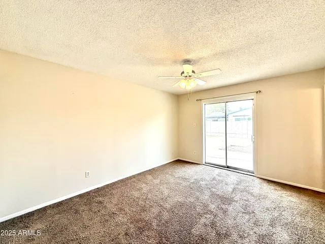 an empty room with a empty space and a window