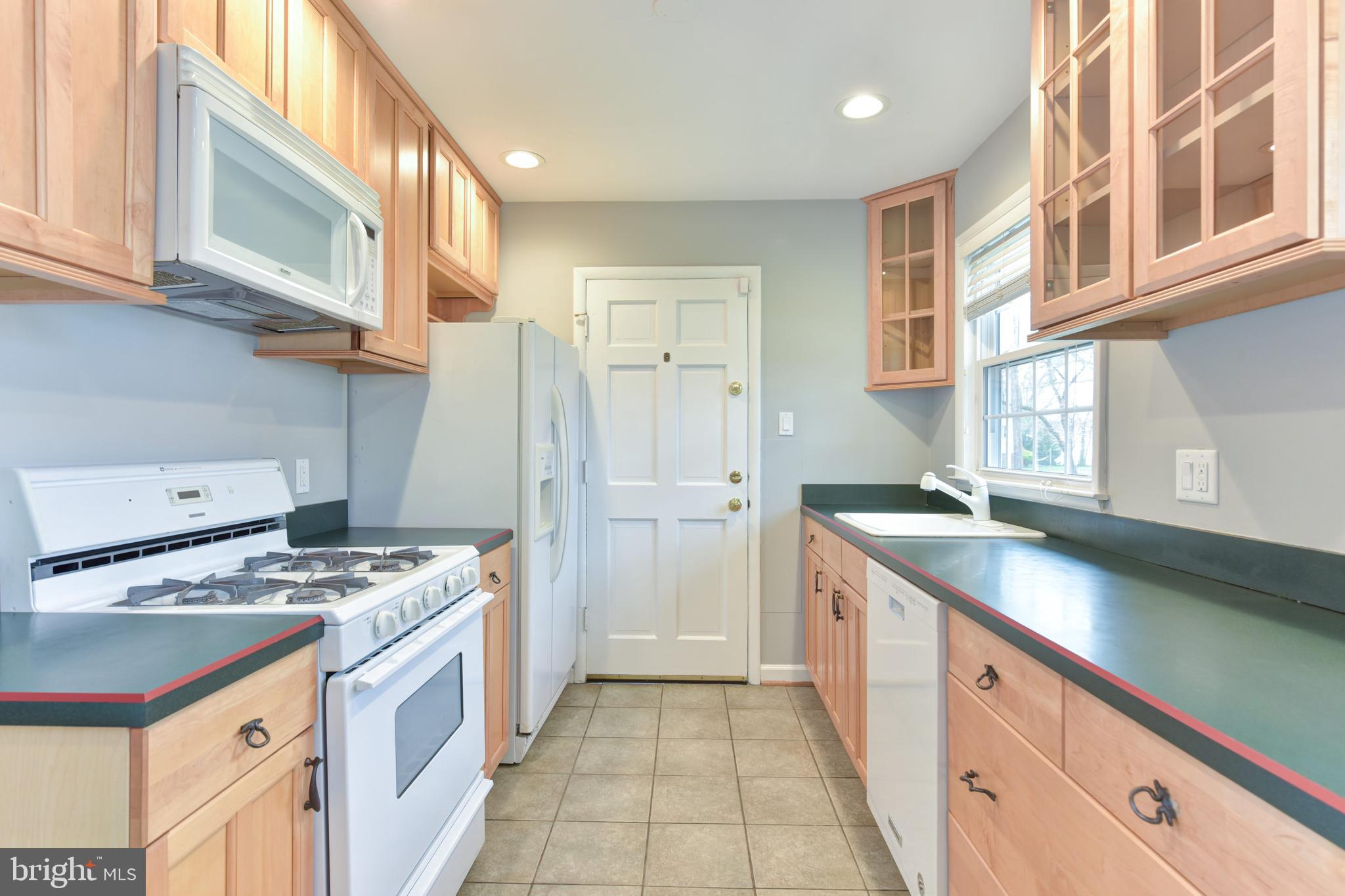 8501 Wagon Wheel Road Alexandria, VA 22309 - Photo 7 of 37 Kitchen with exterior door to carport