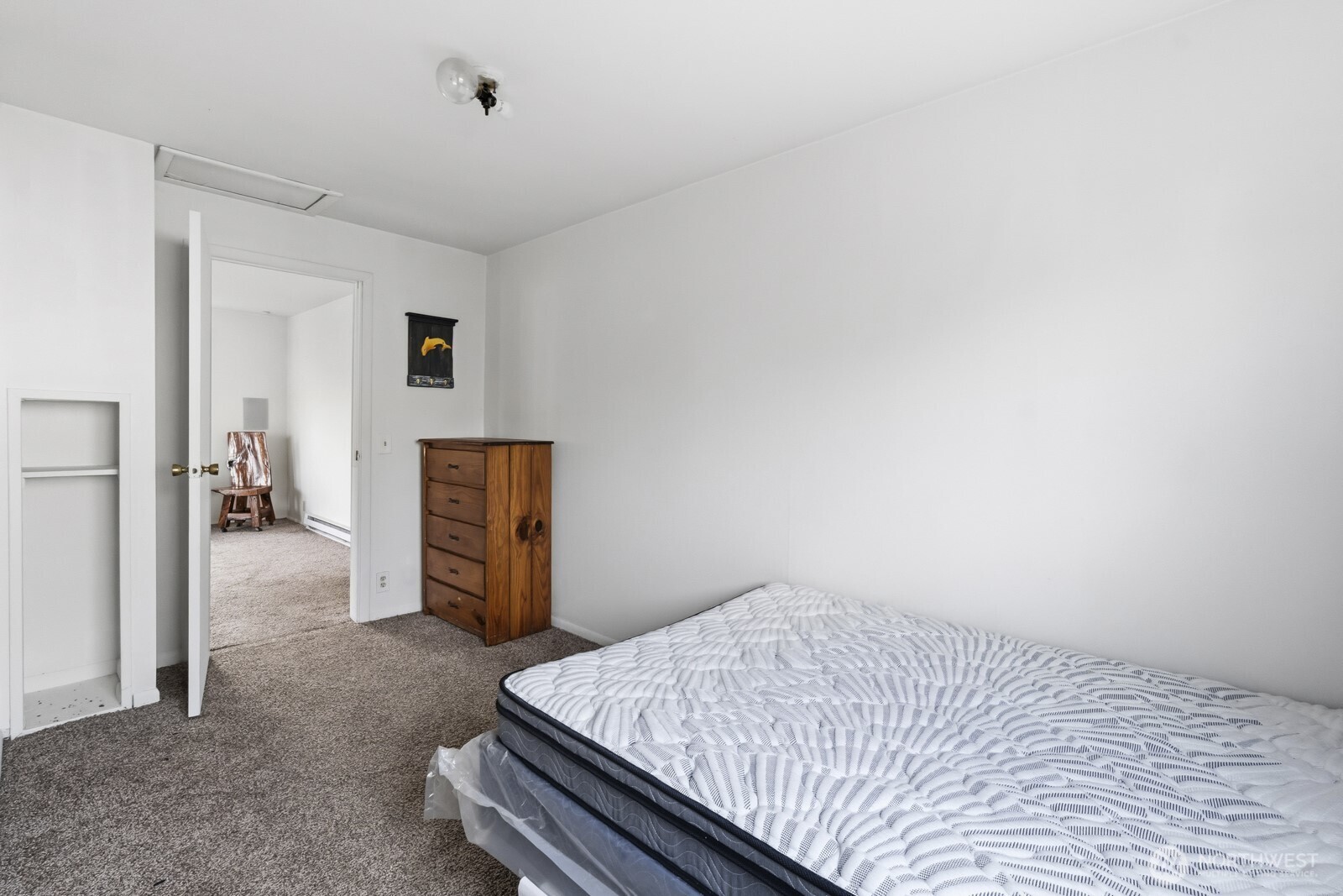 205 Jefferson Street Hoquiam, WA 98550 - Photo 21 of 21 a bedroom with a bed and a view of bathroom