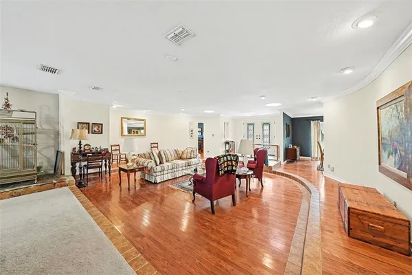 a living room with furniture and a table