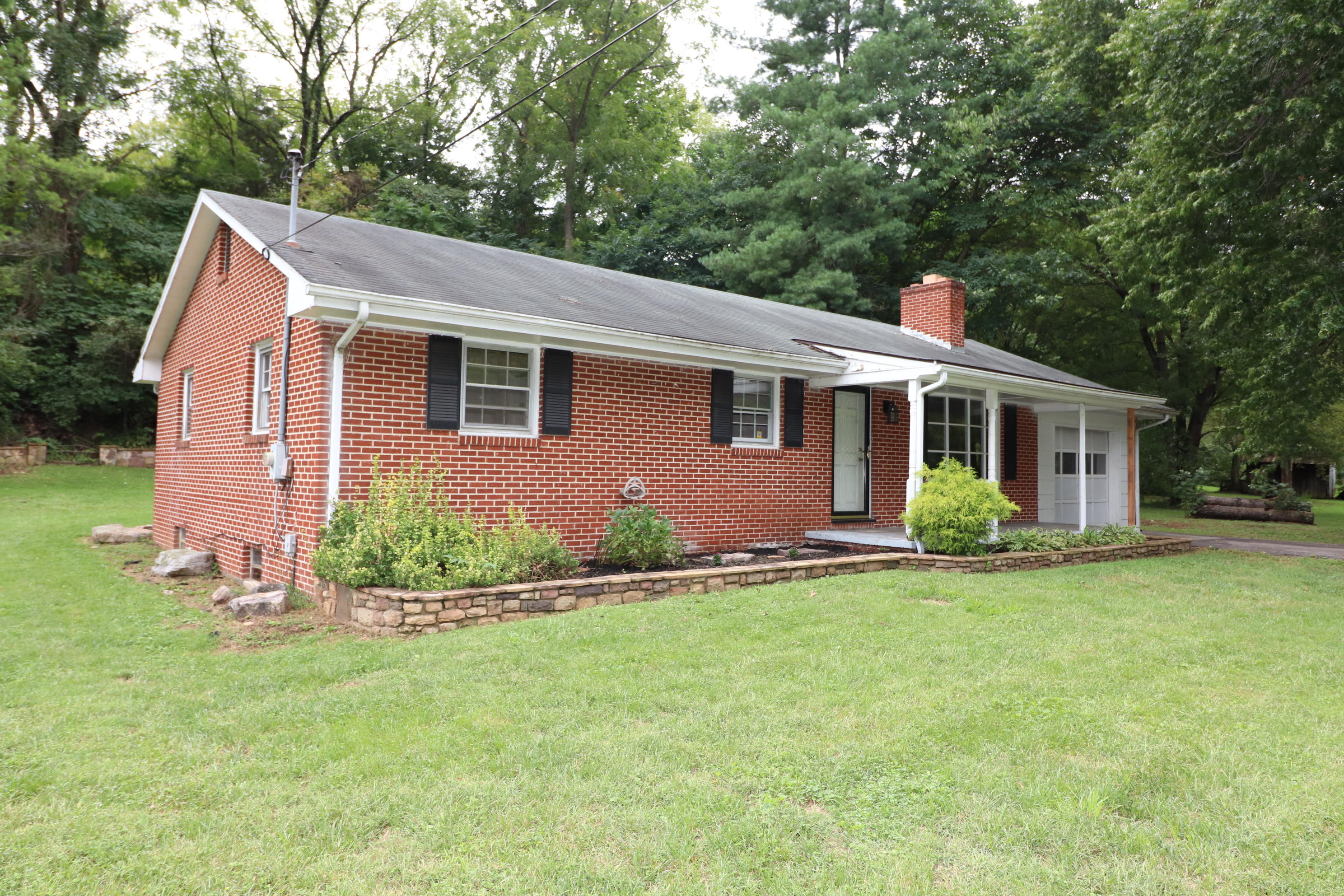 5501 Lafayette Road Elliston, VA 24087 - Photo 3 of 18 a front view of house with yard and green space