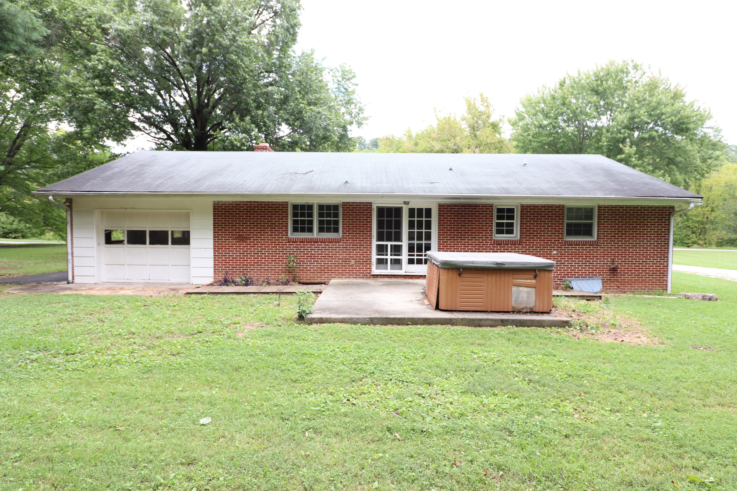 5501 Lafayette Road Elliston, VA 24087 - Photo 5 of 18 a house view with a garden space