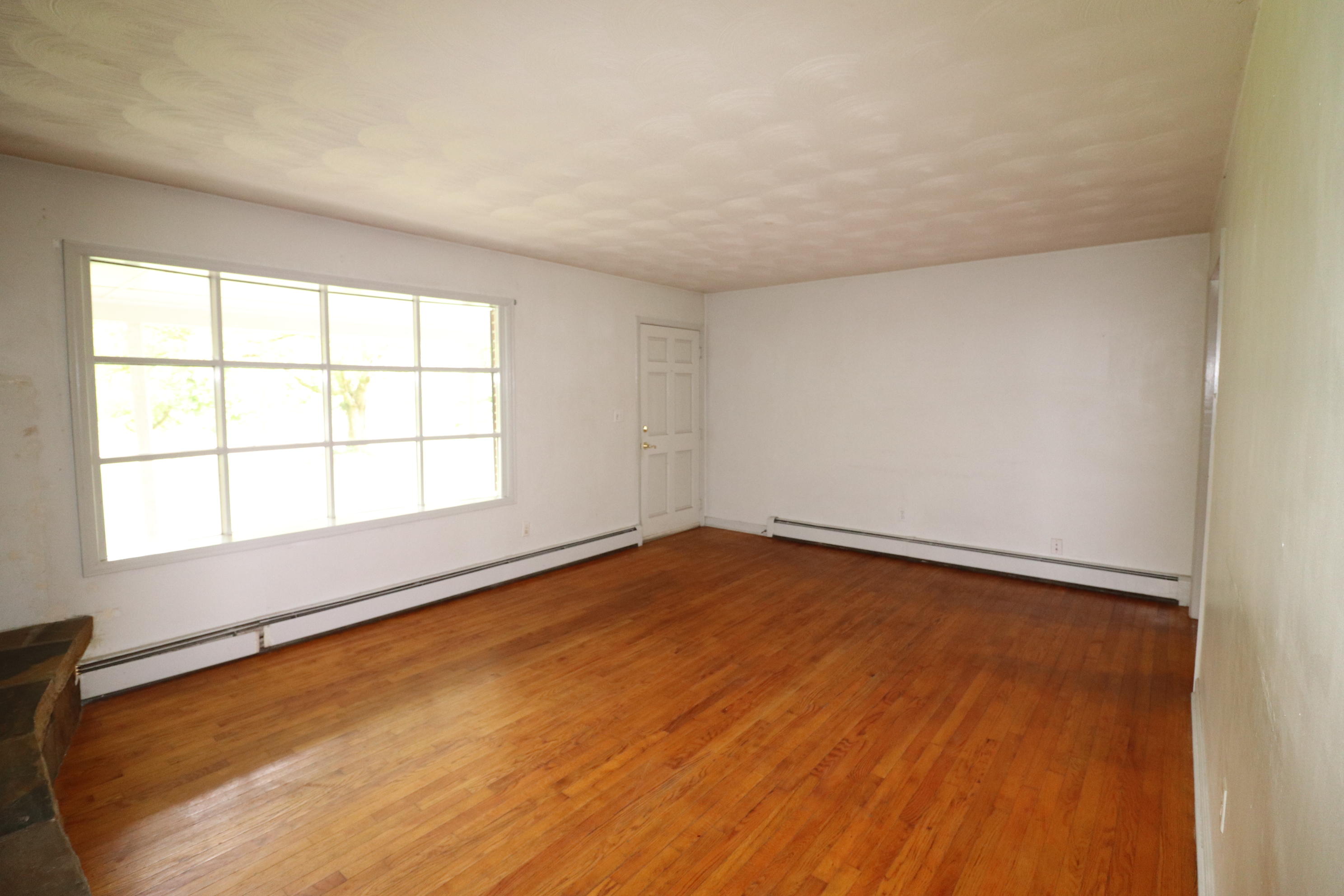 5501 Lafayette Road Elliston, VA 24087 - Photo 9 of 18 an empty room with a window