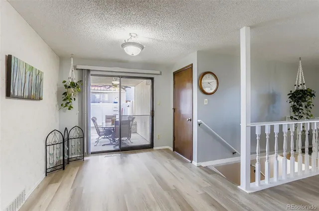 a view of a hallway with entryway