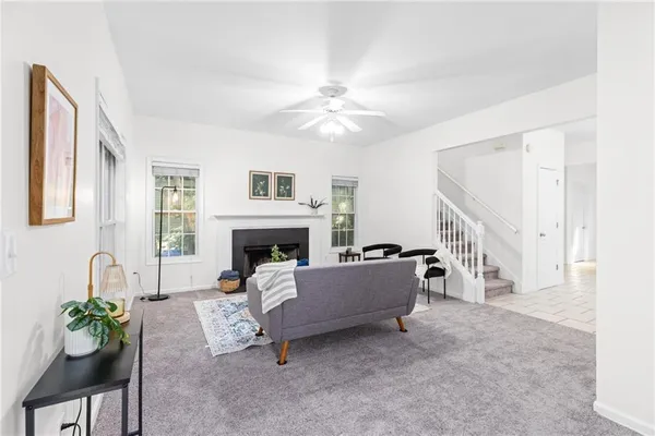 a living room with furniture and a window