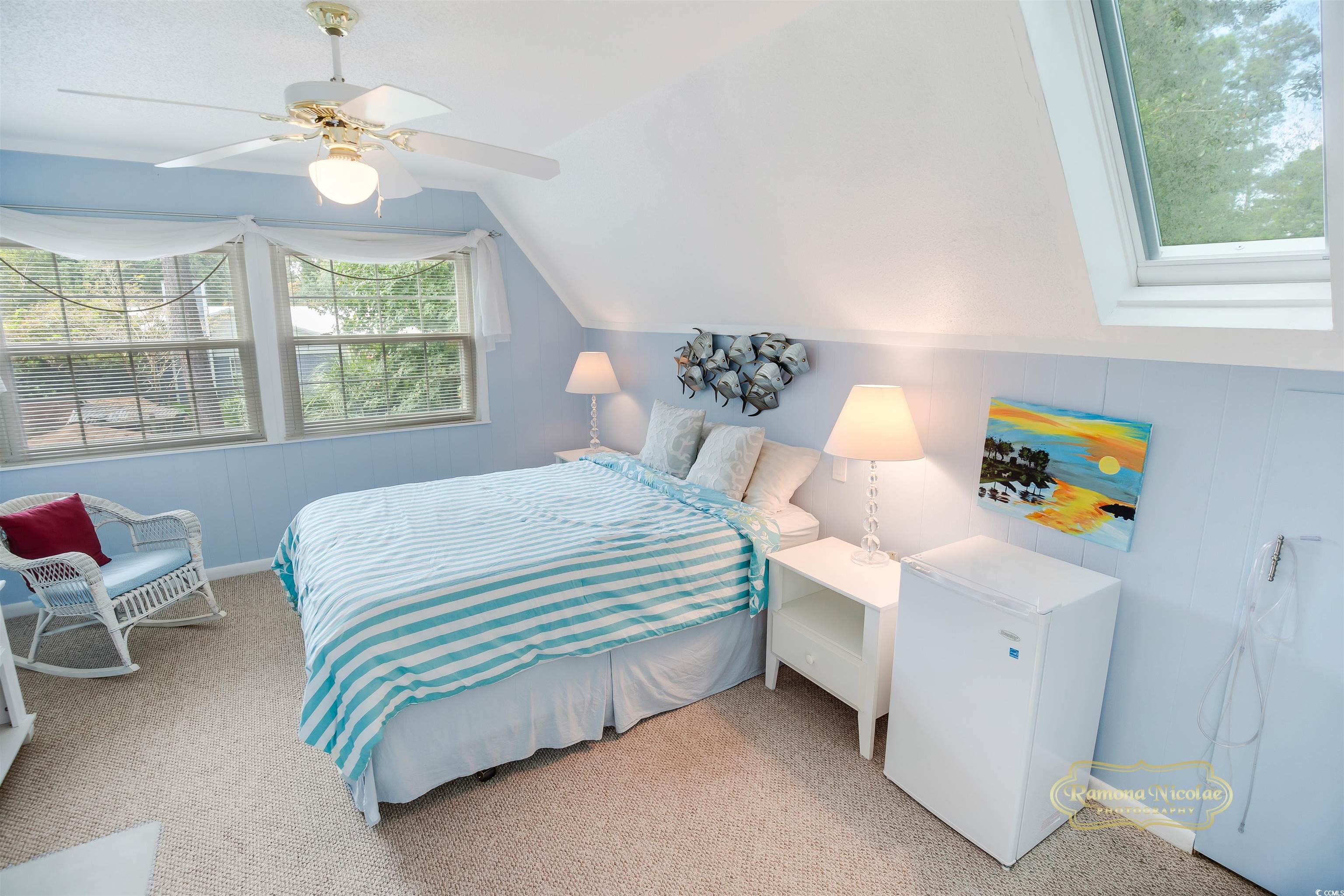 617 3rd Avenue South Surfside Beach, SC 29575 - Photo 22 of 36 Carpeted bedroom featuring refrigerator, lofted ce