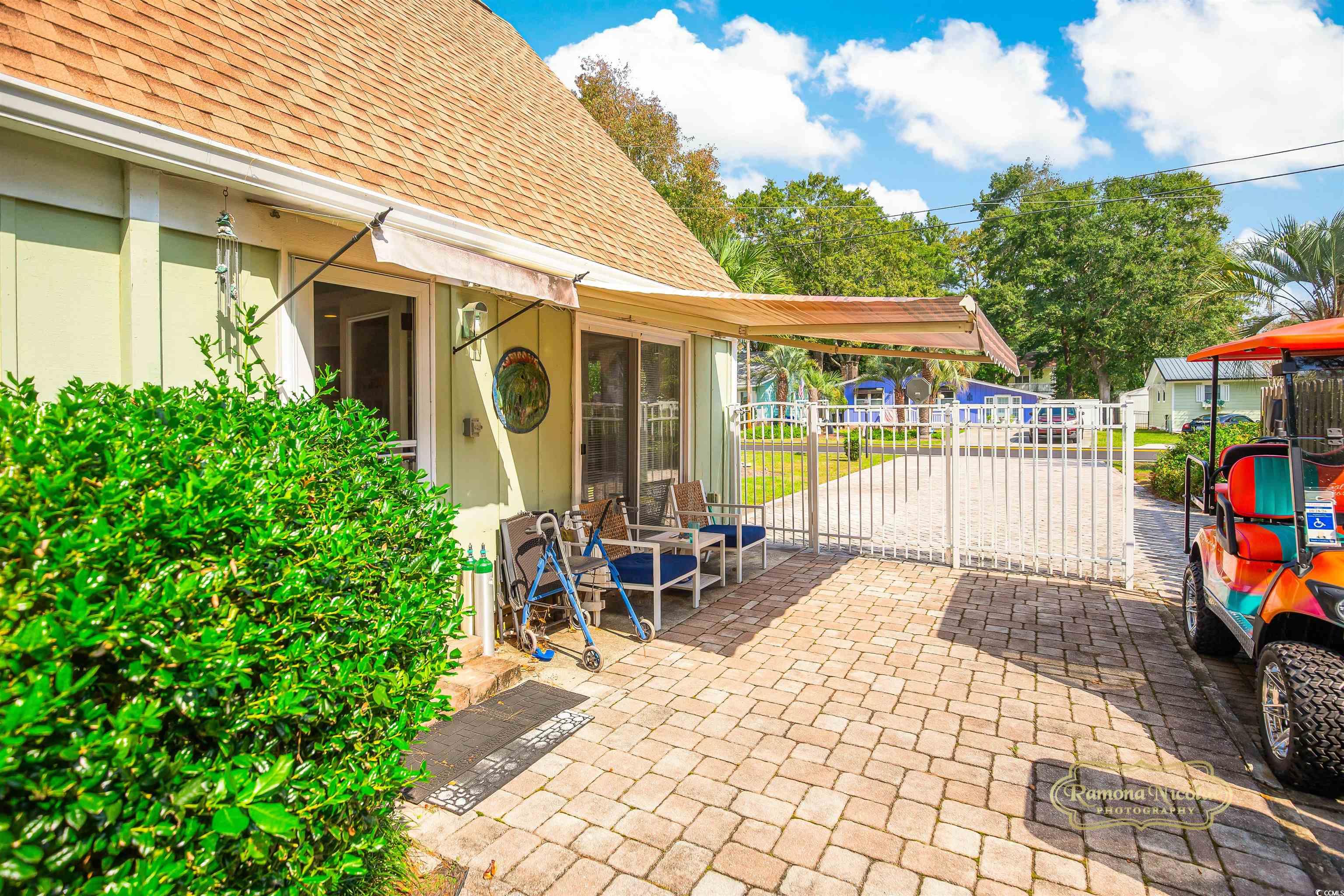 617 3rd Avenue South Surfside Beach, SC 29575 - Photo 5 of 36 side View of patio