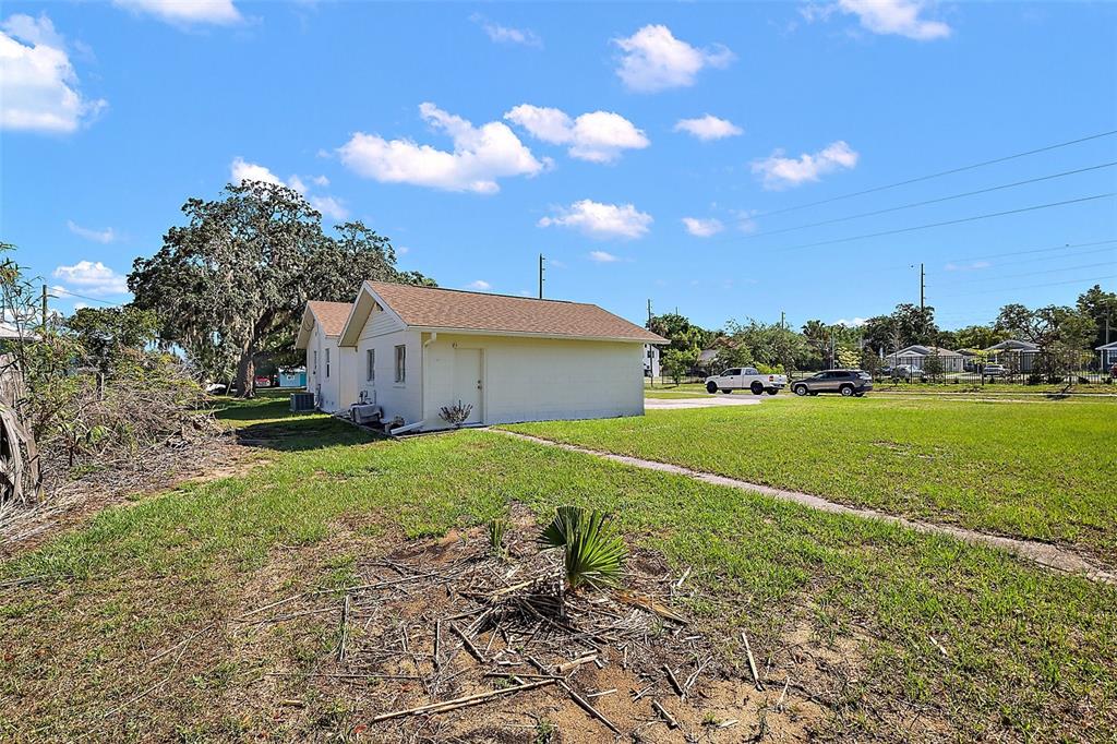30 East Key Avenue Eustis, FL 32726 - Photo 28 of 32 a view of a house with a yard