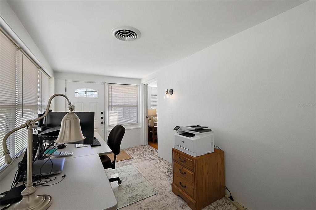 30 East Key Avenue Eustis, FL 32726 - Photo 5 of 32 a view of workspace with gym equipment